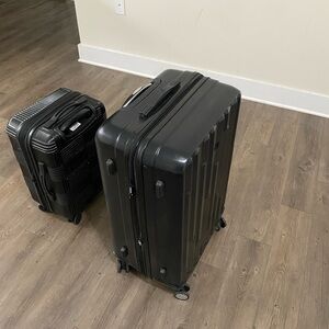 Tucci Italy and American Tourister Black Rolling Luggage Set bundle !!